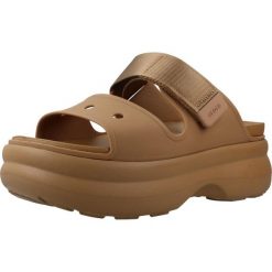 Sandały CROCS 212861C Brązowy. Brązowe sandały damskie Crocs, bez wzorów, z materiału, bez obcasa, bez zapięcia. Za 289.99 zł.