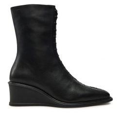 Botki Vagabond Shoemakers. Czarne botki damskie Vagabond Shoemakers, bez obcasa, na koturnie, bez zapięcia. Za 719.99 zł.