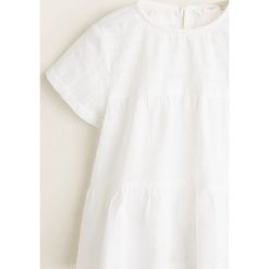 Mango Kids - Top dziecięcy Rachy 110-164 cm. Białe t-shirty i topy dla dziewczynek Mango Kids, bez wzorów, z bawełny, bez ramiączek. W wyprzedaży za 29.90 zł.