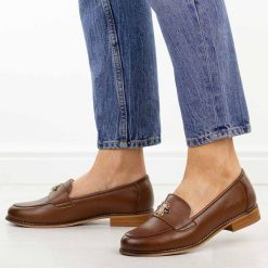 Brązowe skórzane mokasyny damskie Potocki 19382. Brązowe mokasyny damskie POTOCKI, z jeansu, casualowe. Za 229.00 zł.