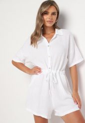 Biały Muślinowy Kombinezon z Bawełny Wiązany w Talii z Guzikami Dlirena. Białe sukienki damskie Born2be, uniwersalny, bez wzorów, z bawełny, eleganckie, bez kołnierzyka, bez ramiączek, mini. Za 119.99 zł.