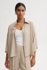 KOSZULA MEL PIASKOWA XL - Flawless. Koszule damskie Flawless, uniwersalny, bez wzorów, z materiału, klasyczne, bez kołnierzyka, bez ramiączek. Za 337.45 zł.