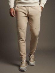 Spodnie jogger dresowe pique - beżowy. Brązowe spodnie sportowe męskie Sinsay, l, bez wzorów, z dresówki. Za 35.99 zł.