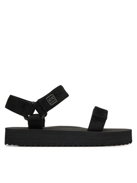 Armani Exchange Sandały XDP064 XV928 00002 Czarny. Czarne sandały damskie Armani Exchange, bez wzorów, z materiału, bez obcasa, na płaskiej podeszwie, bez zapięcia. Za 319.99 zł.
