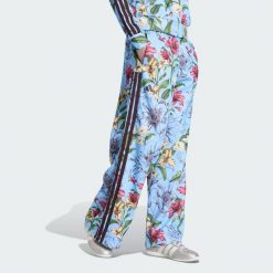 SPODNIE DRESOWE ADIDAS x FARM RIO HOUSE OF TIRO. Czarne spodnie dresowe damskie Adidas, l, bez wzorów, z bawełny. Za 349.00 zł.