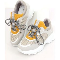 Buty sportowe szare BL170P Yellow. Szare obuwie sportowe damskie ButyModne, bez wzorów, z materiału. W wyprzedaży za 129.00 zł.