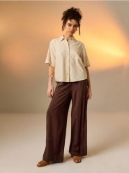 Wiskozowe spodnie wide leg - brązowy. Brązowe spodnie materiałowe damskie Sinsay, l, bez wzorów, z wiskozy. Za 39.99 zł.