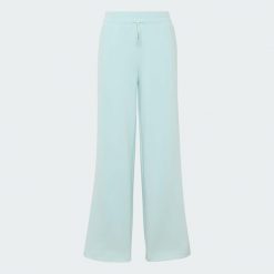 SPODNIE DLA DZIEWCZĄT ADIDAS. Zielone spodnie materiałowe dla dziewczynek Adidas, bez wzorów, z elastanu, z standardowym stanem. Za 199.00 zł.