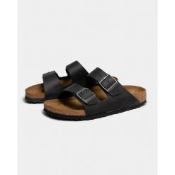Klapki Birkenstock 552113. Czarne klapki męskie Birkenstock, z materiału. Za 813.00 zł.