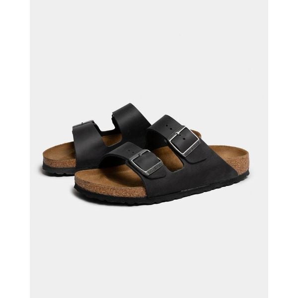Klapki Birkenstock 552113. Czarne klapki męskie Birkenstock, z materiału. Za 813.00 zł.