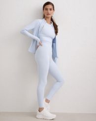 Damskie legginsy z wysokim stanem, squat proof, dla niskich Sense niebieskie. Niebieskie legginsy damskie Aim'n, s, bez wzorów, z elastanu. Za 296.00 zł.