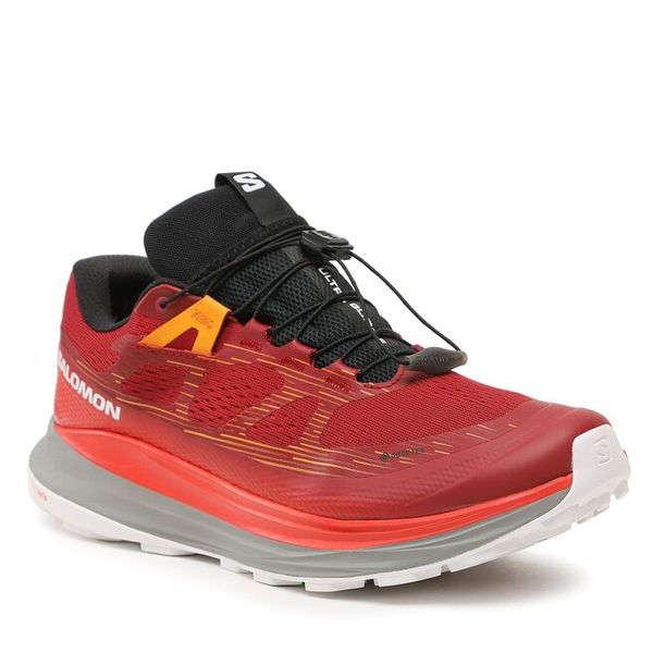 Buty do biegania Salomon. Czerwone buty sportowe męskie Salomon, bez zapięcia, do biegania. Za 829.99 zł.