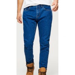 Jeansy COMFORT CARROT - Granatowy. Niebieskie jeansy męskie Cropp. Za 99.99 zł.