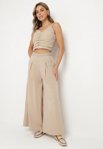 Beżowy Komplet z Wiskozą Top z Usztywnianymi Miseczkami i Szerokie Spodnie Lortebis. Brązowe spodnie materiałowe damskie Born2be, l, z aplikacjami, z wiskozy. Za 99.99 zł.