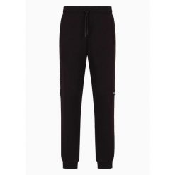 Spodnie dresowe męskie EA7 Emporio Armani sportowe czarne (6DPP57-PJOGZ-1200). Czarne spodnie sportowe męskie EA7, na lato, m, bez wzorów, z dresówki, trekkingowe. Za 379.00 zł.