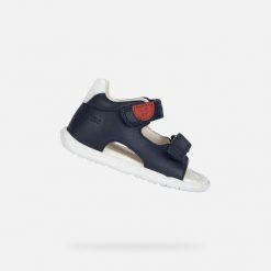 Sandały GEOX B SANDAL MACCHIA BOY Niebieski. Niebieskie sandały męskie Geox, ze skóry, bez zapięcia. Za 174.99 zł.