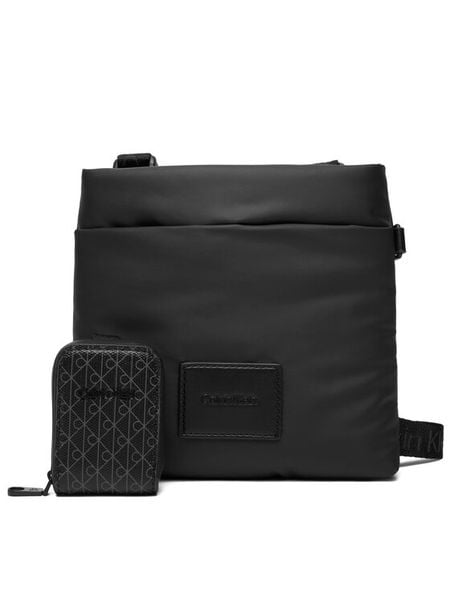 Calvin Klein Saszetka Puffer Utility Flatpack LV04D3224G Czarny. Czarne saszetki męskie Calvin Klein, z materiału. Za 232.99 zł.