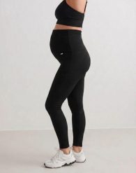 Damskie legginsy ciążowe prążkowane, bezszwowe Ribbed Seamless czarne. Czarne legginsy damskie Aim'n, m, bez wzorów, z dzianiny. Za 258.00 zł.