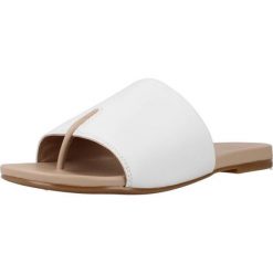 Sandały UNISA CACHO 23 NS Biały. Białe sandały damskie Unisa, bez wzorów, ze skóry, bez obcasa, bez zapięcia. Za 254.99 zł.