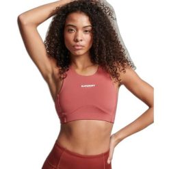 Biustonosz dla kobiet Superdry Active Core. Brązowe obuwie sportowe damskie Superdry., bez wzorów, na fitness i siłownię. W wyprzedaży za 132.60 zł.