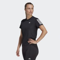 Koszulka do biegania damska Adidas Own the Run Tee. Czarne koszulki sportowe damskie Adidas, xs, bez wzorów, z materiału, bez kołnierzyka, bez ramiączek, do biegania. Za 130.99 zł.
