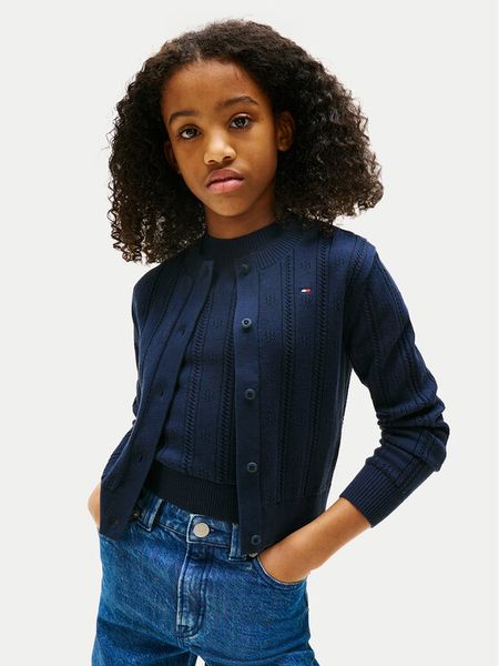 Tommy Hilfiger Kardigan Pointelle KG0KG08677 Granatowy Regular Fit. Niebieskie swetry dla dziewczynek Tommy Hilfiger, bez wzorów, z bawełny, bez kołnierzyka, bez ramiączek, bez kaptura. Za 249.99 zł.