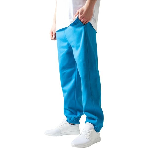 Spodnie Urban Classics basic. Fioletowe spodnie materiałowe męskie Urban Classics, m, bez wzorów. Za 168.50 zł.