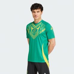 Koszulka Jamaica Pre-Match. Zielone koszulki sportowe męskie Adidas, l, bez wzorów, z materiału, bez kołnierzyka, bez ramiączek, do piłki nożnej. W wyprzedaży za 245.00 zł.