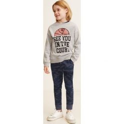 Mango Kids - Spodnie dziecięce Fossil 104-164 cm. Spodnie materiałowe dla chłopców marki Mango Kids. Za 69.90 zł.