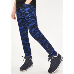 Spodnie jogger - Niebieski. Spodnie materiałowe dla chłopców marki Reserved. W wyprzedaży za 39.99 zł.