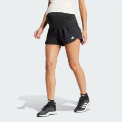 Szorty Pacer Woven Stretch Training Maternity. Białe szorty sportowe damskie Adidas, na lato, l, bez wzorów, z dzianiny, klasyczne, z standardowym stanem, na fitness i siłownię. Za 199.00 zł.