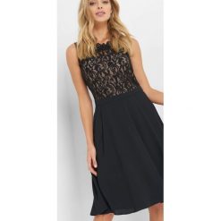 Sukienka z koronkową górą. Czarne sukienki damskie Orsay, w jednolite wzory, z dzianiny, wizytowe, bez rękawów. Za 159.99 zł.