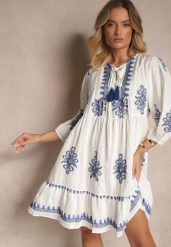 Biała Sukienka z Wiskozą w Stylu Boho o Rozkloszowanym Kroju z Haftem Miredia. Białe sukienki damskie Renee, na co dzień, m, bez wzorów, z bawełny, boho, bez kołnierzyka, bez ramiączek, mini, kopertowe. Za 64.99 zł.