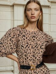 Wiskozowa bluzka koszulowa z bufiastymi rękawami - wielobarwny. Bluzki damskie Sinsay, l, bez wzorów, z wiskozy, bez kołnierzyka, bez ramiączek. Za 39.99 zł.