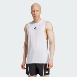 Koszulka Les Mills Graphic Tank. Białe t-shirty męskie Adidas, xl, bez wzorów, bez kołnierzyka. W wyprzedaży za 116.35 zł.