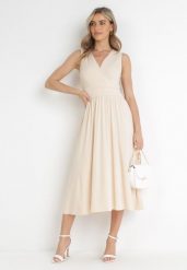 Beżowa Sukienka Midi Bez Rękawów z Plisowanym Dołem Dreana. Brązowe sukienki damskie Born2be, na imprezę, l, bez wzorów, eleganckie, bez kołnierzyka, bez ramiączek, midi, plisowane. Za 189.99 zł.