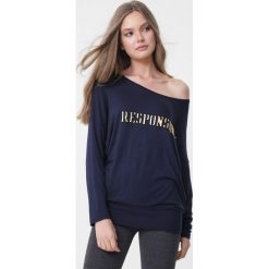 Granatowa Bluzka Anne. Bluzki damskie Born2be, l, bez wzorów, bez kołnierzyka, bez ramiączek. Za 39.99 zł.
