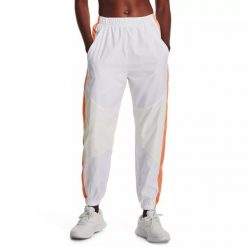 Spodnie dresowe damskie Under Armour Rush Woven Pant. Białe spodnie dresowe damskie Under Armour, m, bez wzorów, z dresówki. Za 199.99 zł.