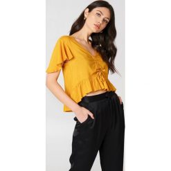 NA-KD Boho Bluzka z rozkloszowanymi rękawami - Orange. Bluzki damskie marki NA-KD Boho. Za 40.95 zł.