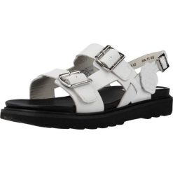 Sandały KICKERS 860710 50 Biały. Białe sandały damskie Kickers, bez wzorów, ze skóry, bez obcasa, bez zapięcia. W wyprzedaży za 381.80 zł.