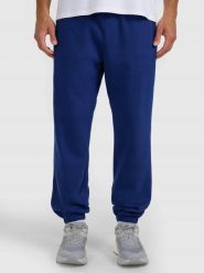 SPODNIE MĘSKIE DRESOWE 4F BRUSH BASIC TTROM1140 S. Niebieskie spodnie sportowe męskie 4f, m, bez wzorów, z bawełny, na fitness i siłownię. Za 149.99 zł.