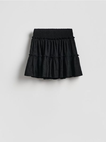 Spódnica ze strukturalnej dzianiny - czarny. Czarne spódnice damskie Reserved, l, bez wzorów, z dzianiny, trapezowe. Za 69.99 zł.