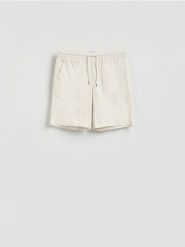 Szorty jogger regular fit - złamana biel. Szorty męskie Reserved, l, bez wzorów, z bawełny. Za 119.99 zł.