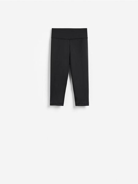 Legginsy capri - czarny. Czarne legginsy damskie Reserved, l, bez wzorów, z dzianiny. Za 69.99 zł.