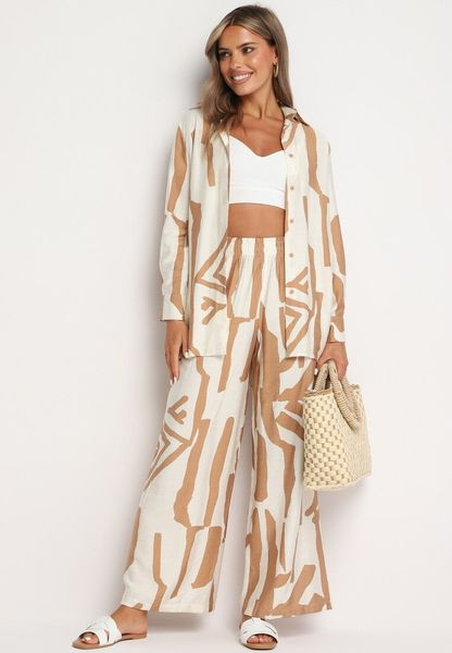 Beżowy Komplet z Wiskozy Koszula z Długim Rękawem Szerokie Spodnie z Gumką w Talii Nelvima. Brązowe koszule damskie Born2be, na lato, l, bez wzorów, z wiskozy, bez kołnierzyka, bez ramiączek. Za 149.99 zł.