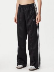 Adidas Spodnie dresowe Satin Sst KS9372 Czarny Loose Fit. Czarne spodnie dresowe damskie Adidas, m, bez wzorów, z dresówki. Za 349.99 zł.