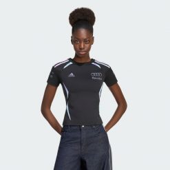 KOSZULKA AUDI REVOLUT F1 TEAM TEAMGEIST. Czarne koszulki sportowe damskie Adidas, l, bez wzorów, z dzianiny, bez kołnierzyka, bez ramiączek. Za 259.00 zł.