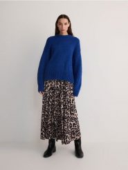 Spódnica w panterkę - wielobarwny. Spódnice damskie Reserved, l, bez wzorów, z dzianiny, rozkloszowane. W wyprzedaży za 49.99 zł.