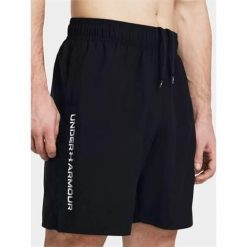 Spodnie treningowe męskie Under Armour 1383356001. Białe spodnie sportowe męskie Under Armour, l, bez wzorów. Za 224.99 zł.