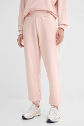 GUESS Różowe dresowe damskie spodnie Primula, Rozmiar M. Czerwone spodnie dresowe damskie Guess, m, z aplikacjami, z dresówki. W wyprzedaży za 251.99 zł.